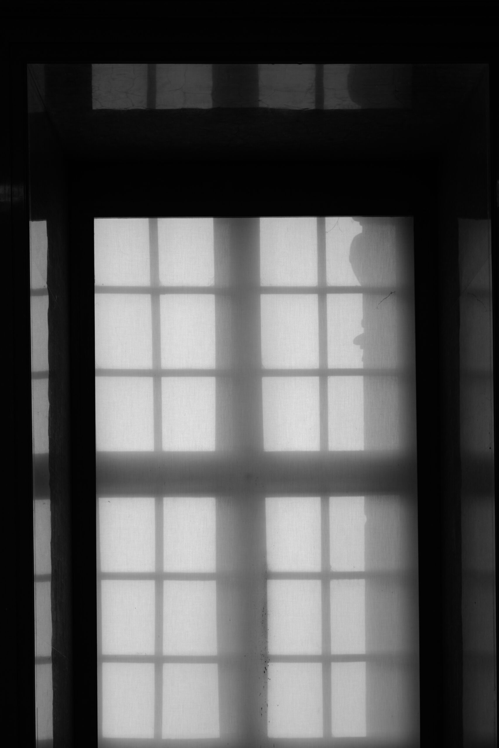 schaduw van een raam in zwart/wit.